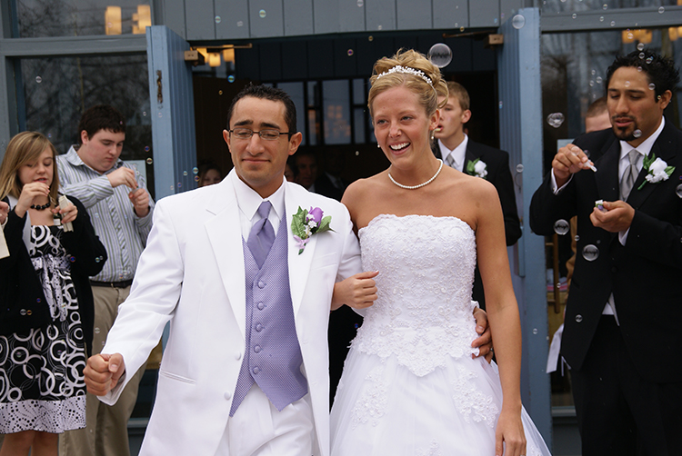 bridal and groom with bubbles